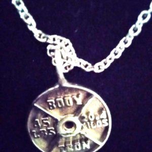 14 Carat White Gold 45 lb Plate Pendant